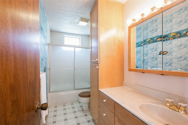 965 Ranch Ln, Kalispell, MT 59901 - full bath with vanity, a textured ceiling, enclosed tub / shower combo, and tile patterned floors