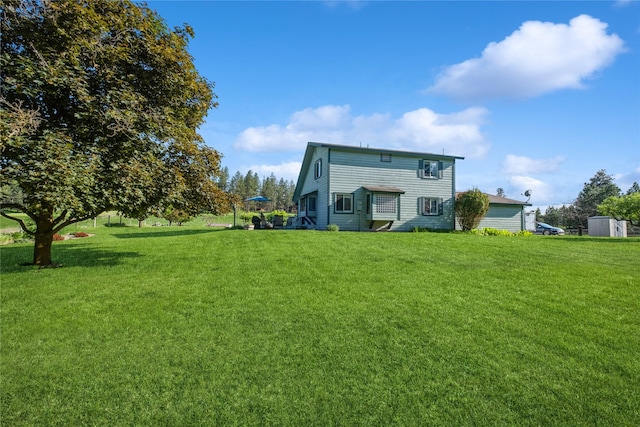 965 Ranch Ln, Kalispell, MT 59901 - back of property featuring a yard
