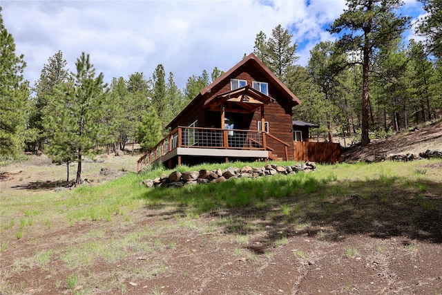 208 Paul Creek Ln, Cascade, MT 59421 - log cabin featuring a deck and a view of trees