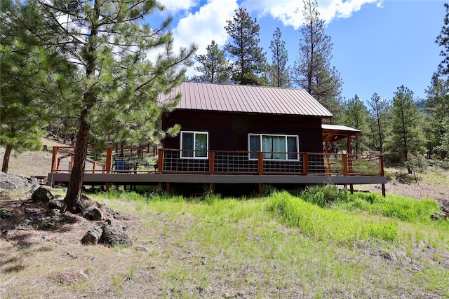 208 Paul Creek Ln, Cascade, MT 59421 - view of front of property featuring a wooden deck and metal roof