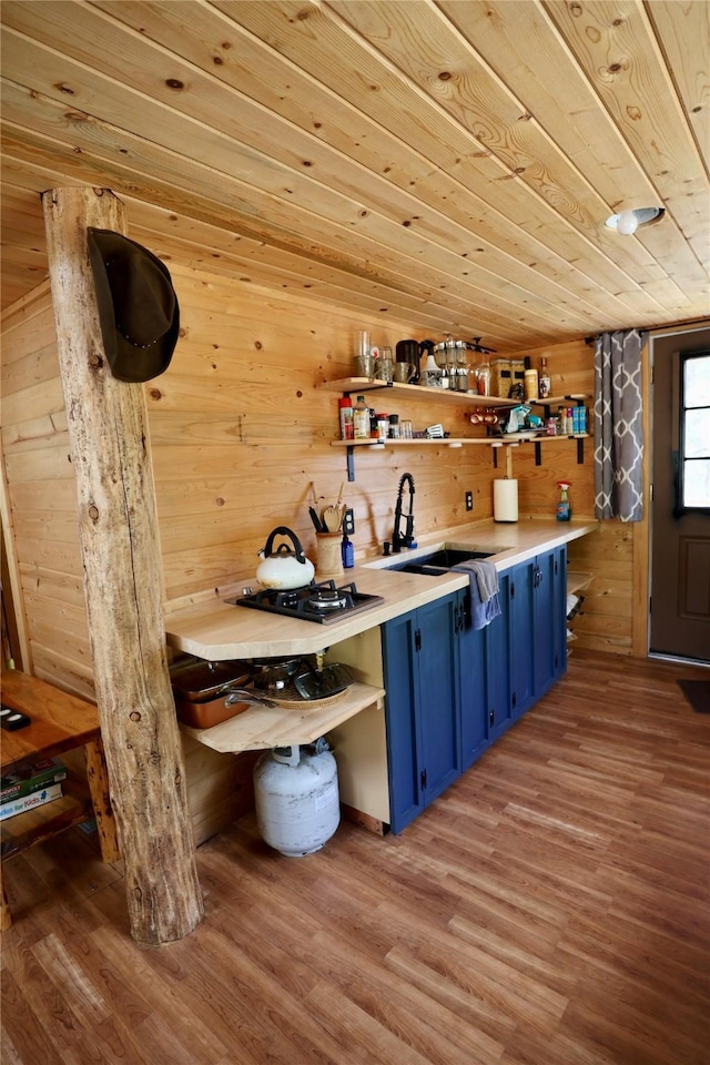 208 Paul Creek Ln, Cascade, MT 59421 - bar area with a sink, wood finished floors, wooden walls, and wooden ceiling