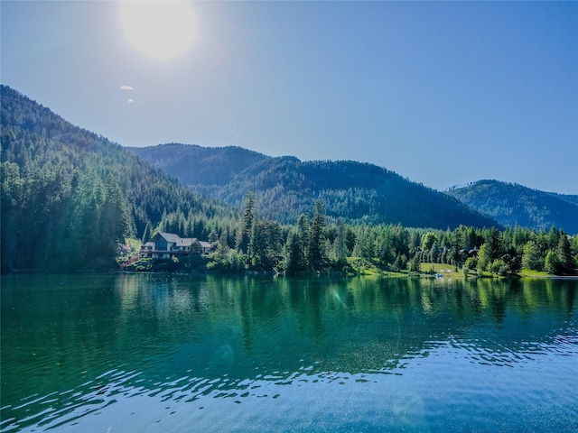 29 Northshore Dr, Troy, MT 59935 - water view featuring a heavily wooded area and a mountainous background