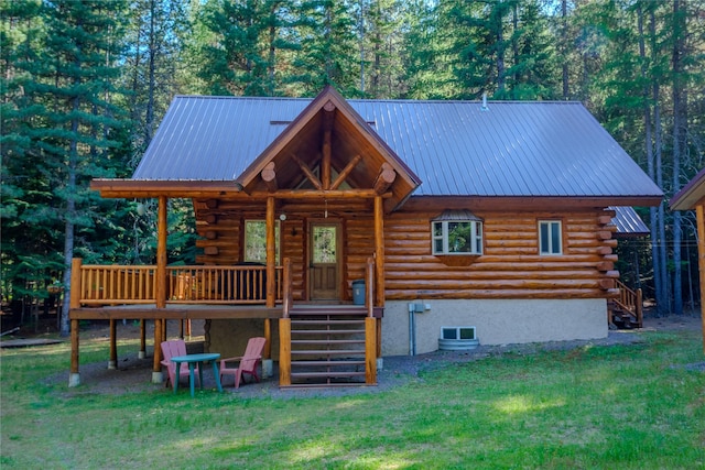 29 Northshore Dr, Troy, MT 59935 - view of front of home with stairway, log siding, a front lawn, and metal roof