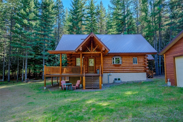 29 Northshore Dr, Troy, MT 59935 - log-style house featuring stairway, log exterior, a front yard, and metal roof