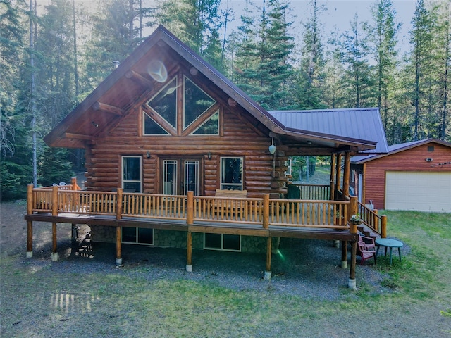 29 Northshore Dr, Troy, MT 59935 - log cabin featuring a deck, an outdoor structure, log siding, and french doors