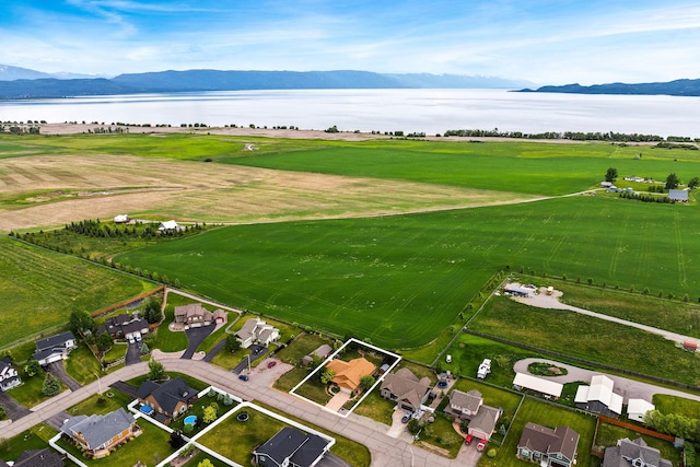 1399 Mackinaw Loop, Somers, MT 59932 - aerial overview of property's location featuring a water and mountain view and property boundaries highlighted