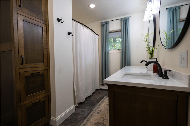 1511 E Broadway St, Helena, MT 59601 - full bathroom with double vanity, baseboards, recessed lighting, and a shower with shower curtain