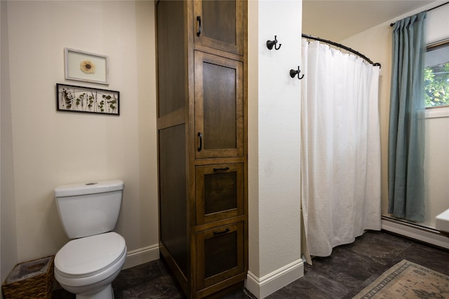 1511 E Broadway St, Helena, MT 59601 - bathroom featuring baseboards, toilet, a shower with curtain, and a baseboard radiator