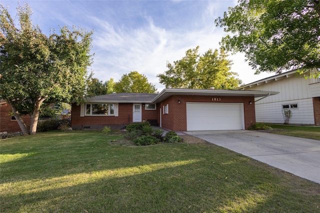 1511 E Broadway St, Helena, MT 59601 - single story home featuring brick siding, a garage, driveway, and a front lawn
