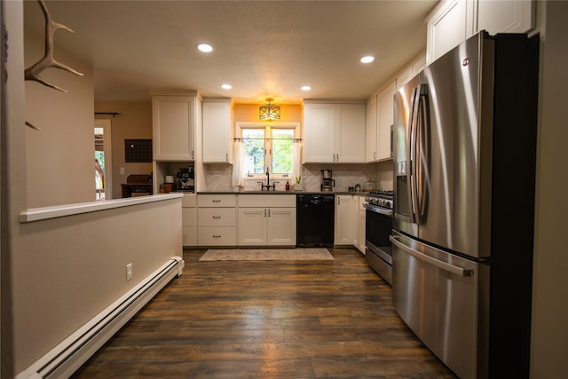 1511 E Broadway St, Helena, MT 59601 - kitchen featuring appliances with stainless steel finishes, baseboard heating, recessed lighting, white cabinets, and dark wood-style floors