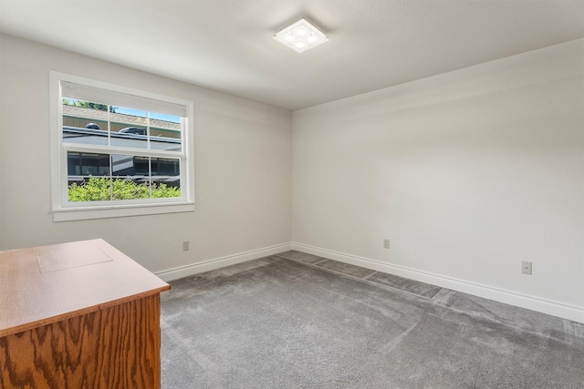 238 Red Fox Rd, Lolo, MT 59847 - carpeted spare room featuring baseboards