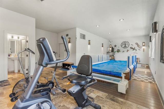 238 Red Fox Rd, Lolo, MT 59847 - workout room with baseboards and recessed lighting