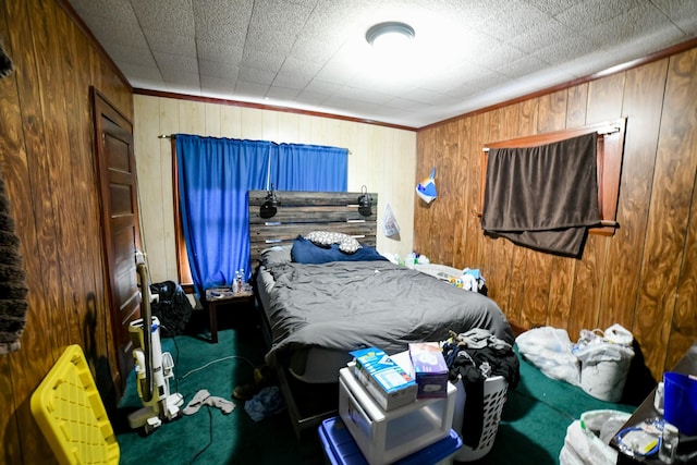 712 9th St N, Great Falls, MT 59401 - bedroom featuring wooden walls, carpet, and ornamental molding