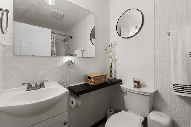 1108 4th Ave W, Columbia Falls, MT 59912 - bathroom with toilet, tasteful backsplash, vanity, and a shower with curtain