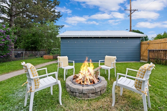 1108 4th Ave W, Columbia Falls, MT 59912 - view of yard with a fire pit
