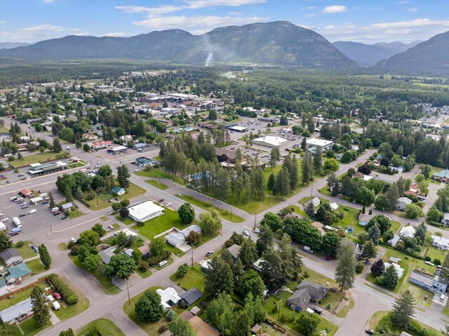 1108 4th Ave W, Columbia Falls, MT 59912 - aerial view of property's location featuring a mountainous background