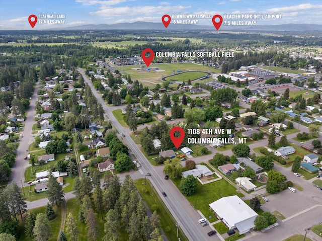 1108 4th Ave W, Columbia Falls, MT 59912 - aerial view of property's location with mountains