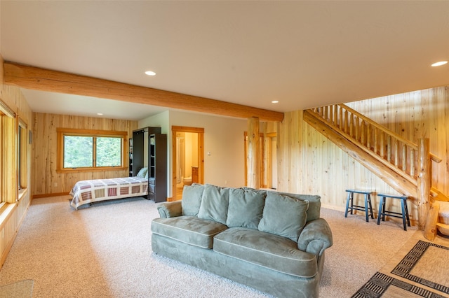 599 Talon Trl, Columbia Falls, MT 59912 - carpeted living room with wooden walls, recessed lighting, stairs, baseboards, and beam ceiling