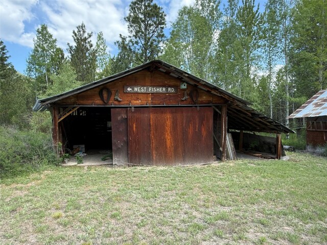 63450 US Highway 2, Libby, MT 59923 - view of pole building featuring a lawn