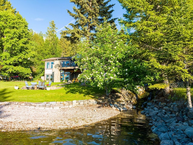 34777 Compass Ln, Polson, MT 59860 - back of property featuring a yard and a wooden deck
