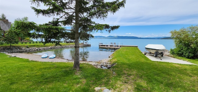 34777 Compass Ln, Polson, MT 59860 - dock with a water and mountain view and a yard