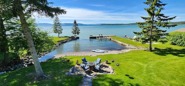 34777 Compass Ln, Polson, MT 59860 - water view with a boat dock and mountains