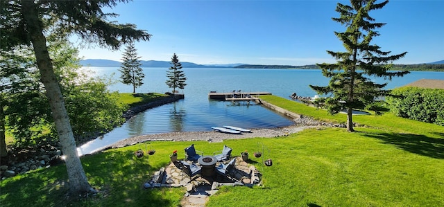 34777 Compass Ln, Polson, MT 59860 - water view featuring a boat dock and mountains