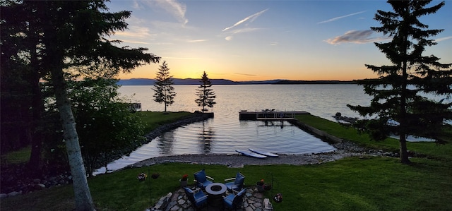 34777 Compass Ln, Polson, MT 59860 - dock area with a water and mountain view and a yard