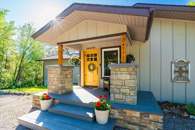 34777 Compass Ln, Polson, MT 59860 - entrance to property with a porch and board and batten siding