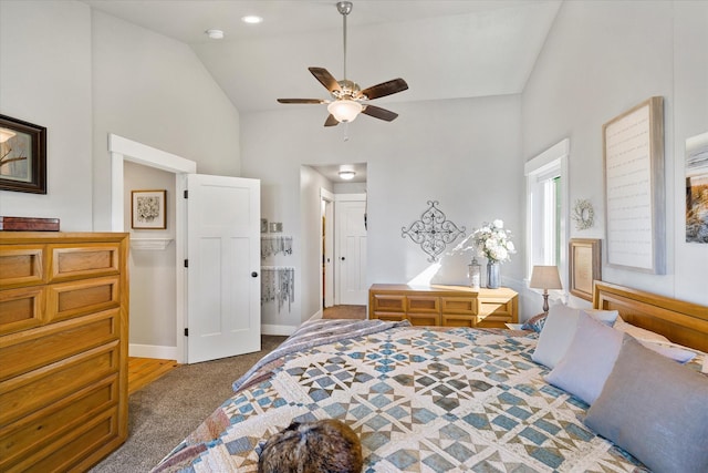 34777 Compass Ln, Polson, MT 59860 - carpeted bedroom featuring high vaulted ceiling, baseboards, and ceiling fan