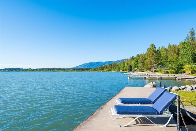 34777 Compass Ln, Polson, MT 59860 - dock featuring a water and mountain view