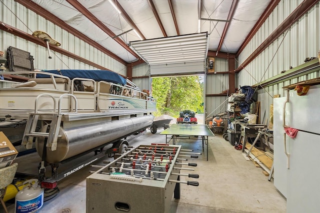 34777 Compass Ln, Polson, MT 59860 - garage featuring freestanding refrigerator