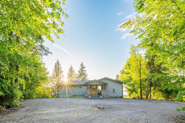 34777 Compass Ln, Polson, MT 59860 - mid-century inspired home featuring stone siding