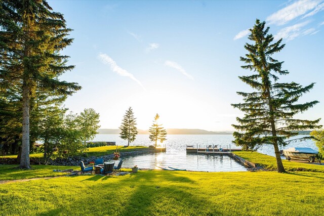 34777 Compass Ln, Polson, MT 59860 - dock area featuring a water view and a yard