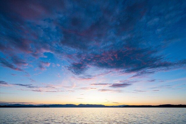 34777 Compass Ln, Polson, MT 59860 - water view with a mountain backdrop