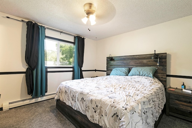 239 Essex St, Lolo, MT 59847 - carpeted bedroom featuring a textured ceiling, a baseboard heating unit, and ceiling fan