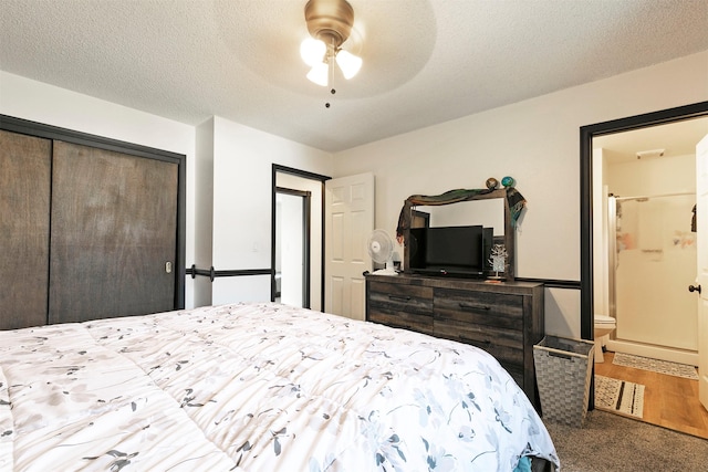 239 Essex St, Lolo, MT 59847 - bedroom with a closet, ensuite bath, and ceiling fan