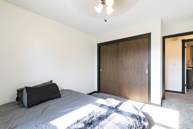 239 Essex St, Lolo, MT 59847 - bedroom featuring light carpet, a closet, ceiling fan, and baseboards
