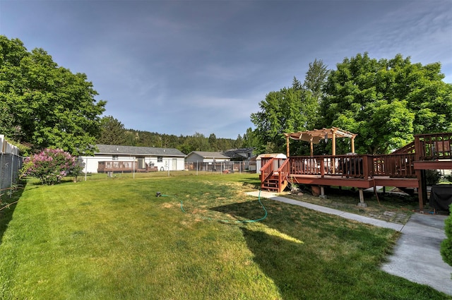 239 Essex St, Lolo, MT 59847 - view of yard featuring a wooden deck and a pergola