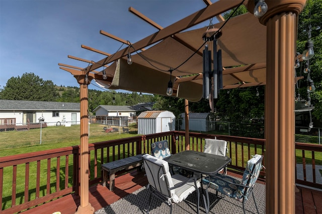 239 Essex St, Lolo, MT 59847 - wooden terrace featuring outdoor dining area