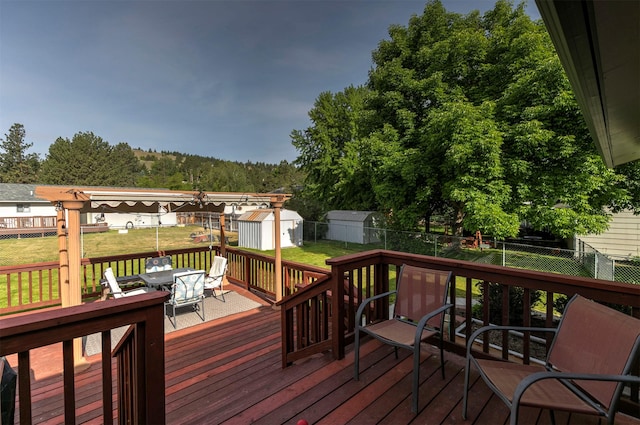 239 Essex St, Lolo, MT 59847 - wooden deck with outdoor dining area
