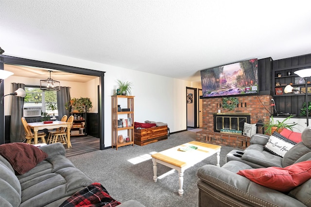 239 Essex St, Lolo, MT 59847 - carpeted living area with a brick fireplace and a textured ceiling