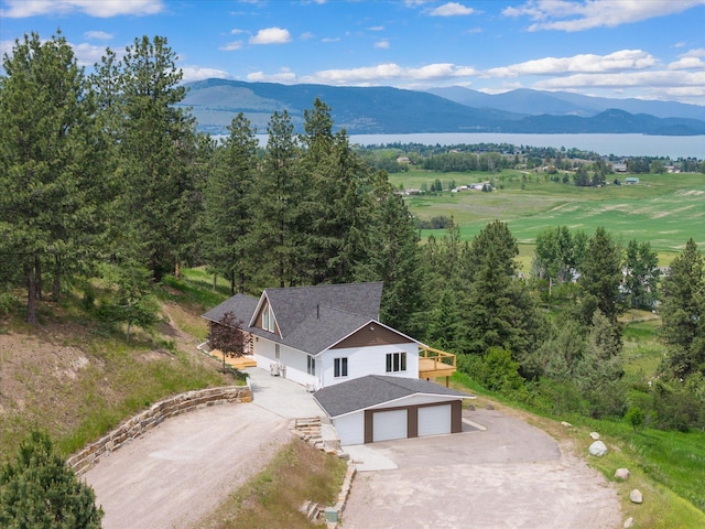 35280 Bennington Ln, Polson, MT 59860 - aerial view of property and surrounding area with a water and mountain view