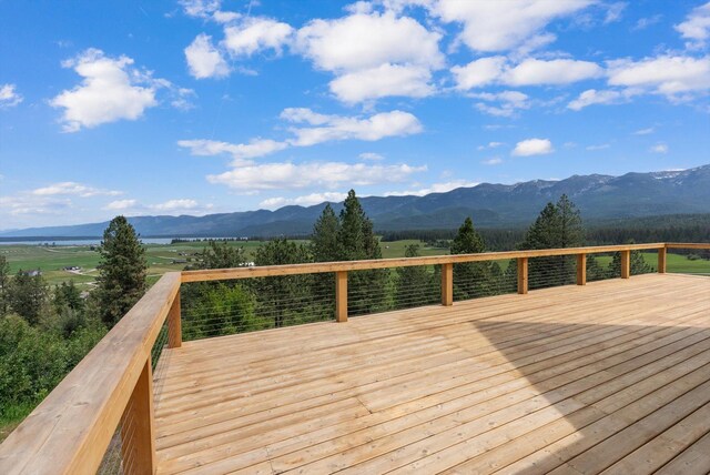 35280 Bennington Ln, Polson, MT 59860 - wooden terrace with a mountain view