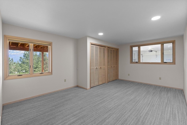 35280 Bennington Ln, Polson, MT 59860 - unfurnished bedroom with baseboards, carpet floors, and recessed lighting