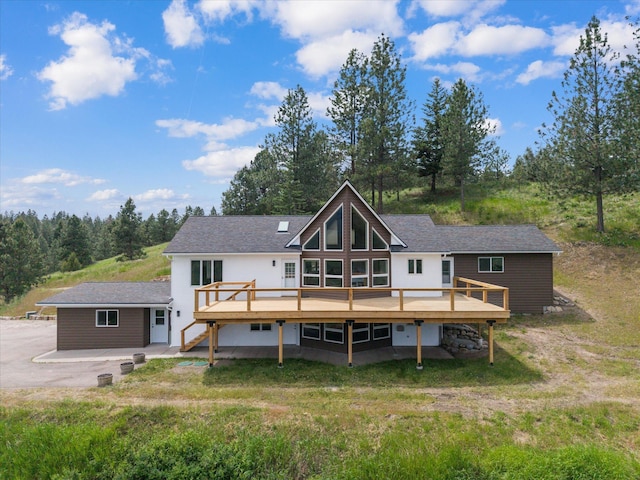 35280 Bennington Ln, Polson, MT 59860 - rear view of property featuring a deck and a patio