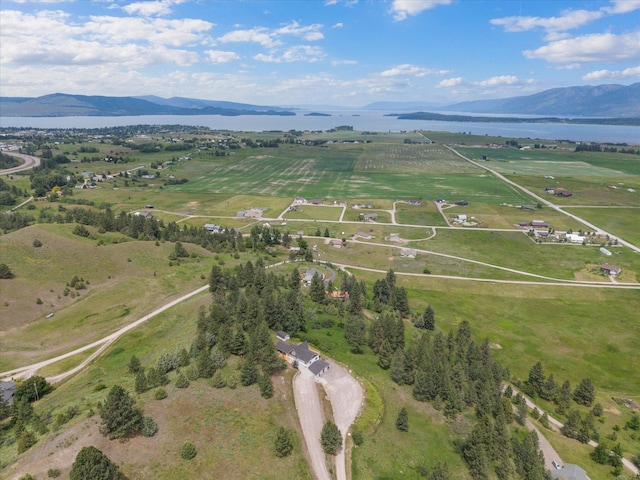 35280 Bennington Ln, Polson, MT 59860 - aerial overview of property's location with a water and mountain view and rural landscape