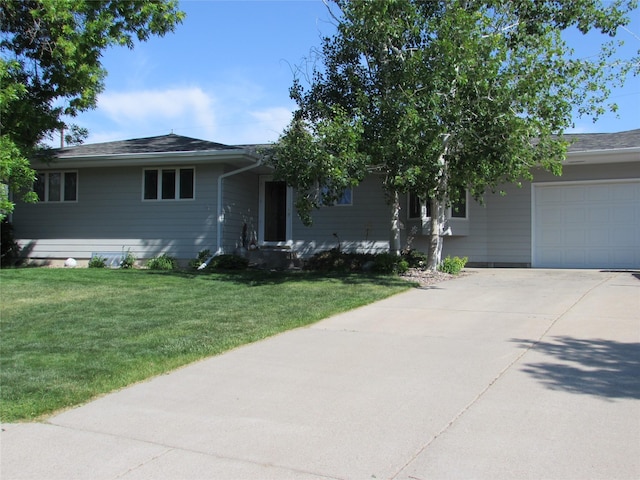 706 49th St S, Great Falls, MT 59405 - ranch-style house with a garage, driveway, and a front yard