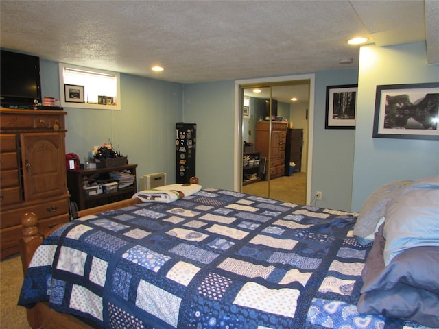 706 49th St S, Great Falls, MT 59405 - carpeted bedroom featuring a textured ceiling and a closet