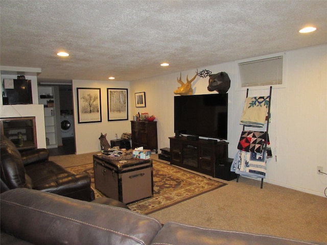 706 49th St S, Great Falls, MT 59405 - living room featuring washer / dryer, carpet floors, recessed lighting, a textured ceiling, and a fireplace